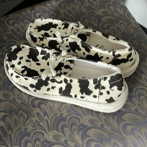 Brand new size 7 Gypsy Jazz brand cow print shoes